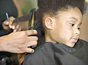 Hotcomb: Burnt ears, singed hair, flinching but all for the love of that glossy straight hair for all of 5 minutes!